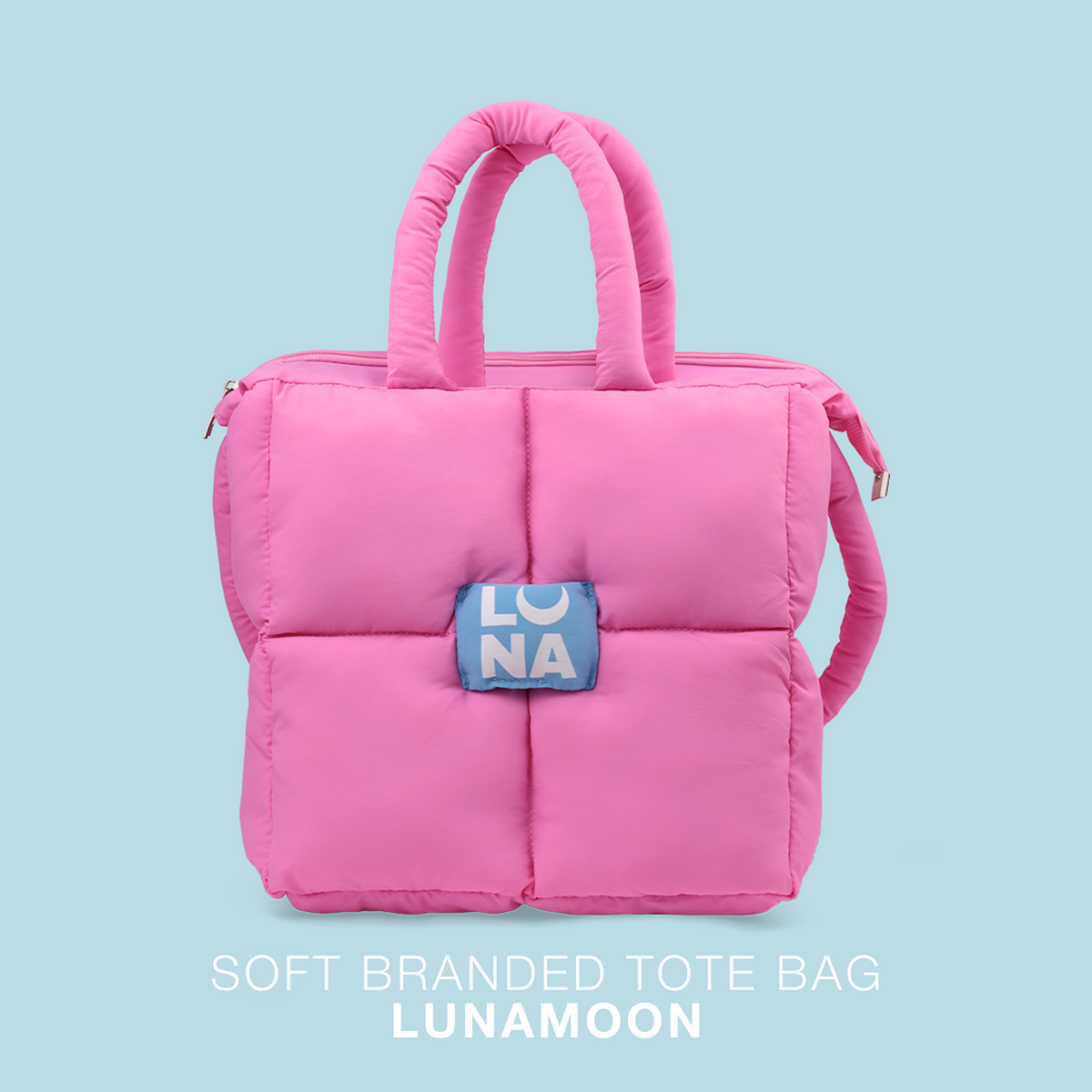 Bolso tote acolchado LUNAmoon rosa visto de frente, con el acolchado en cuatro cuadros