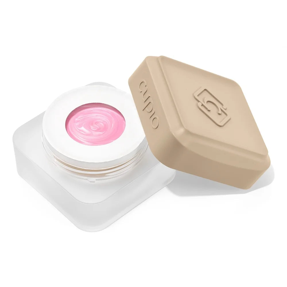 Tarro abierto del Builder Gel Cupio Pearl Bloom Pink Glow de 15 ml en rosa perlado